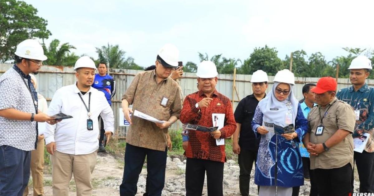 Kementrian PKP Bersama Pemkab Rohul Tinjau Penanganan Kawasan Kumuh Danau Dipo Boncah Balong  Kementrian PKP Bersama Pemkab Rohul Tinjau Penanganan Kawasan Kumuh Danau Dipo Boncah Balong
